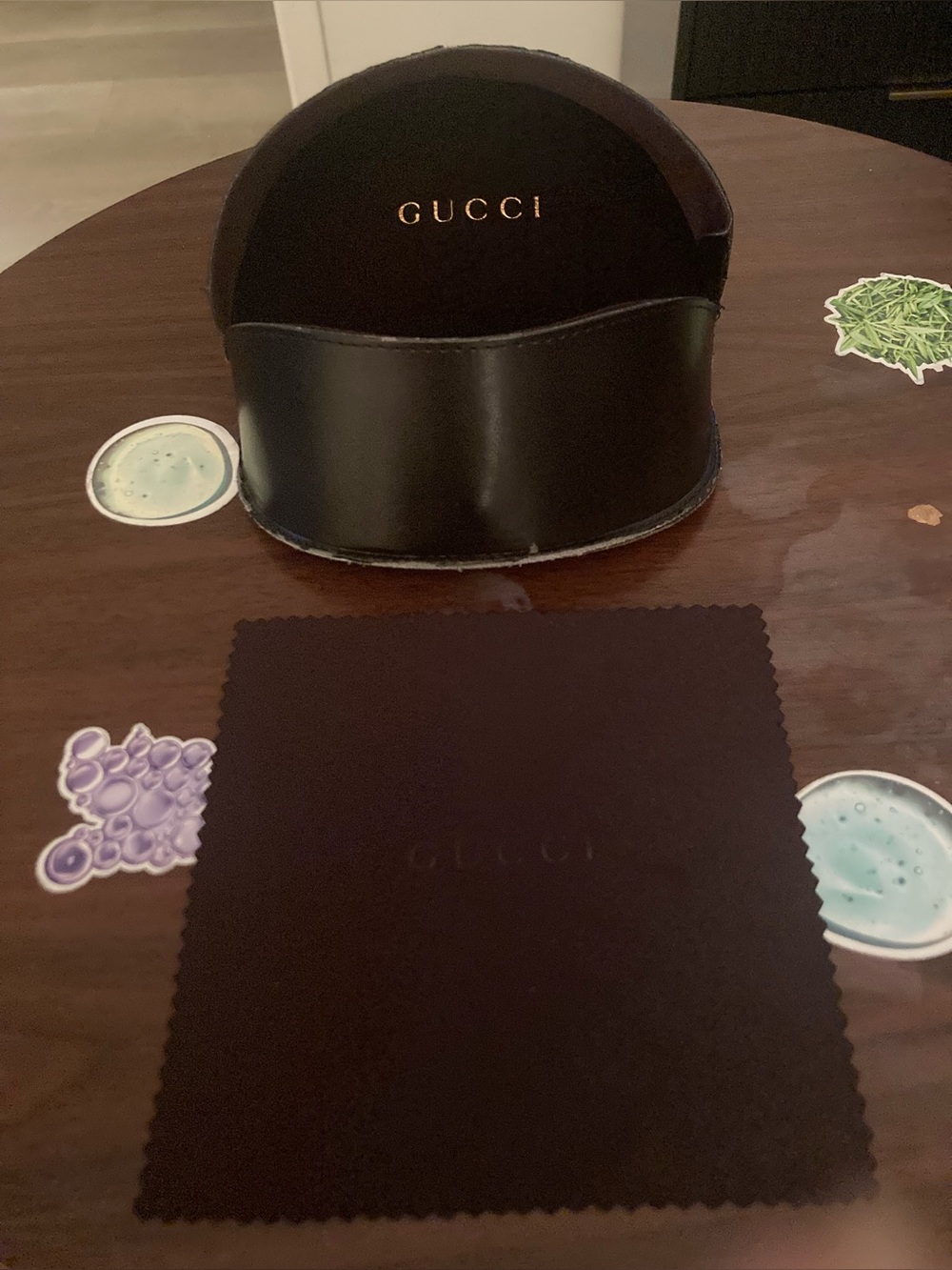 Black Authentic Gucci sunglasses case.